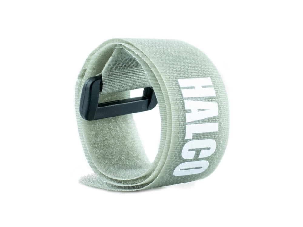 a buckle strap rolled up with the word HALCO printed on it